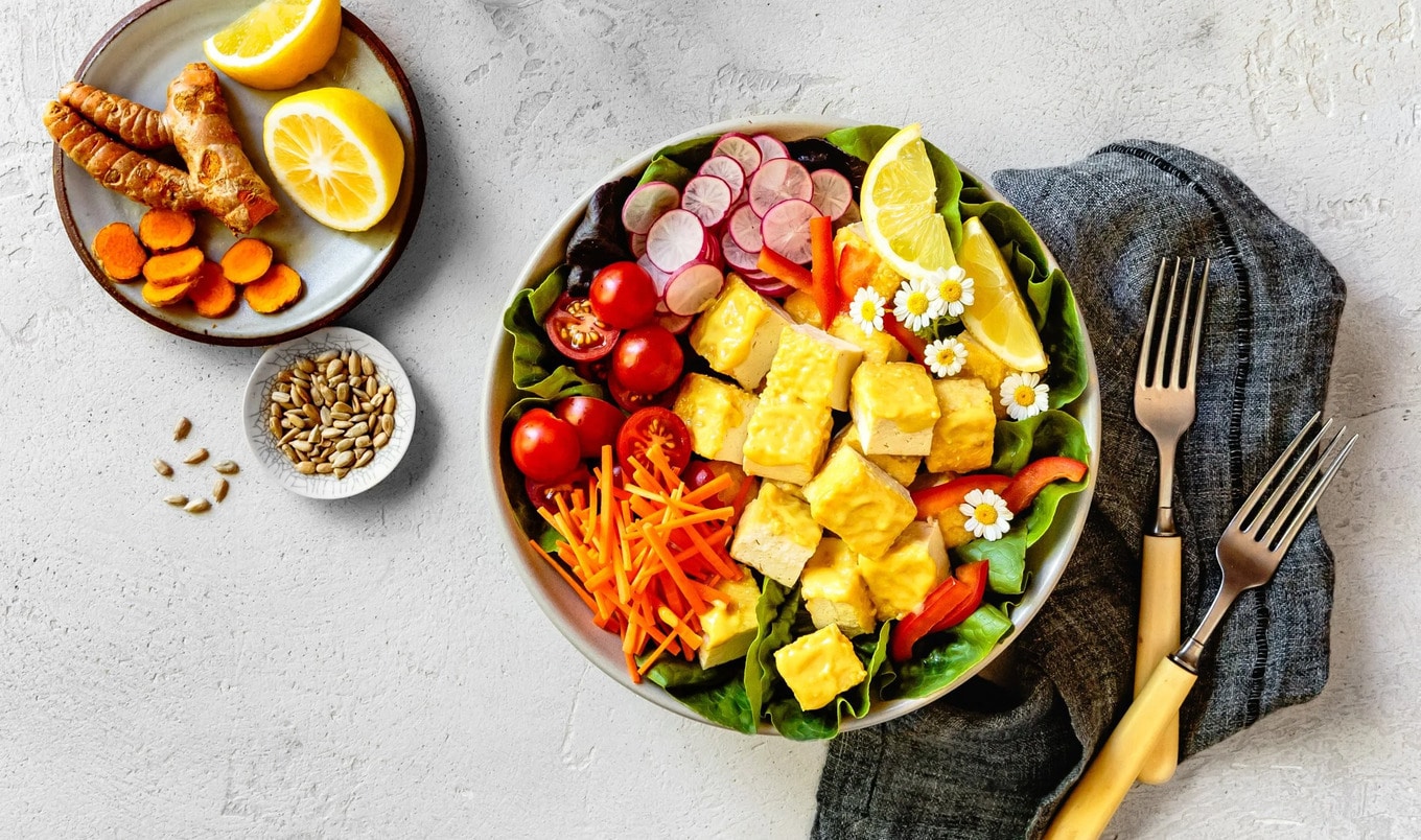 Golden Turmeric Tofu and Spinach Salad With Tahini Dressing